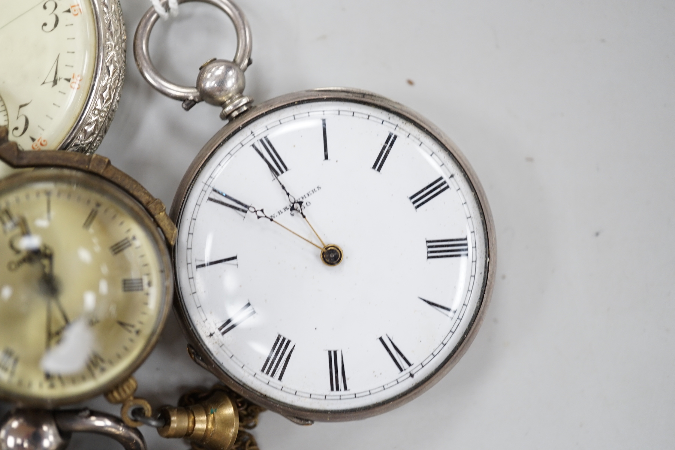 Thirteen assorted pocket and fob watches including silver Exchange and silver J.W. Benson.